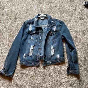 Blue ripped jean jacket